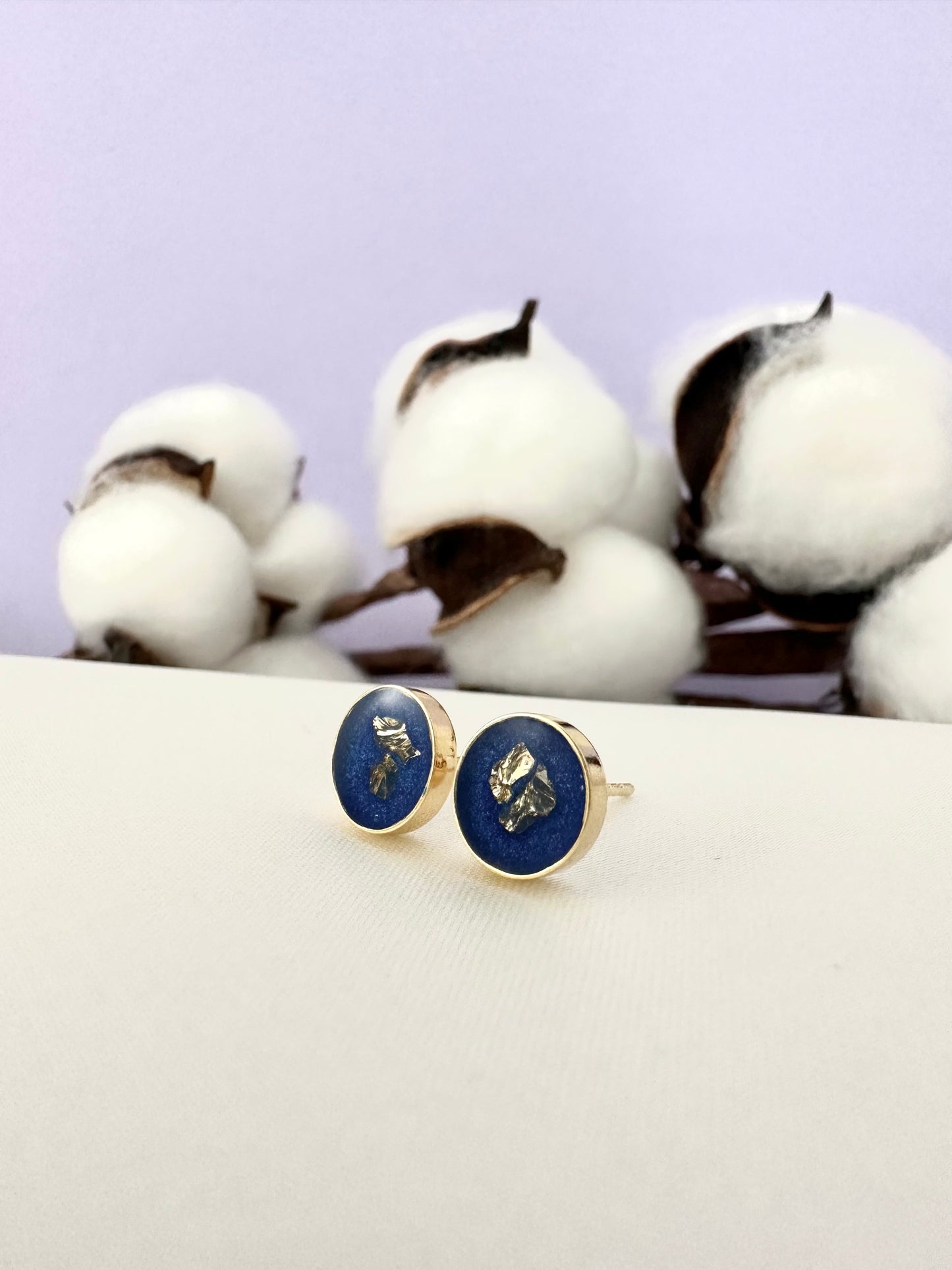 Blue earrings with golden stones