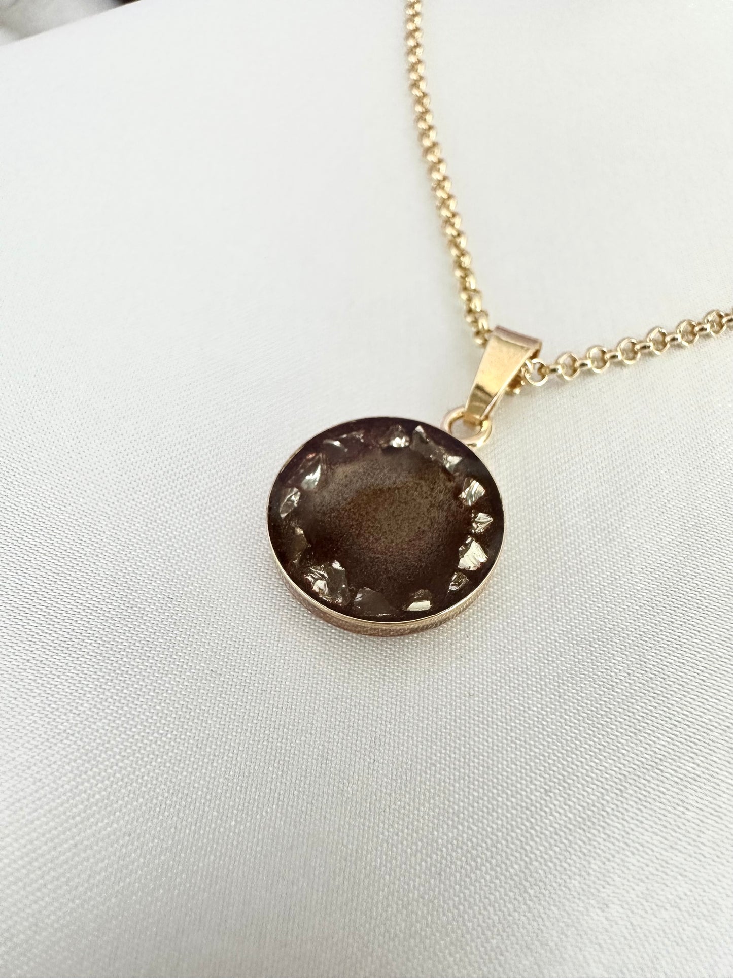 Brown necklace with golden stones